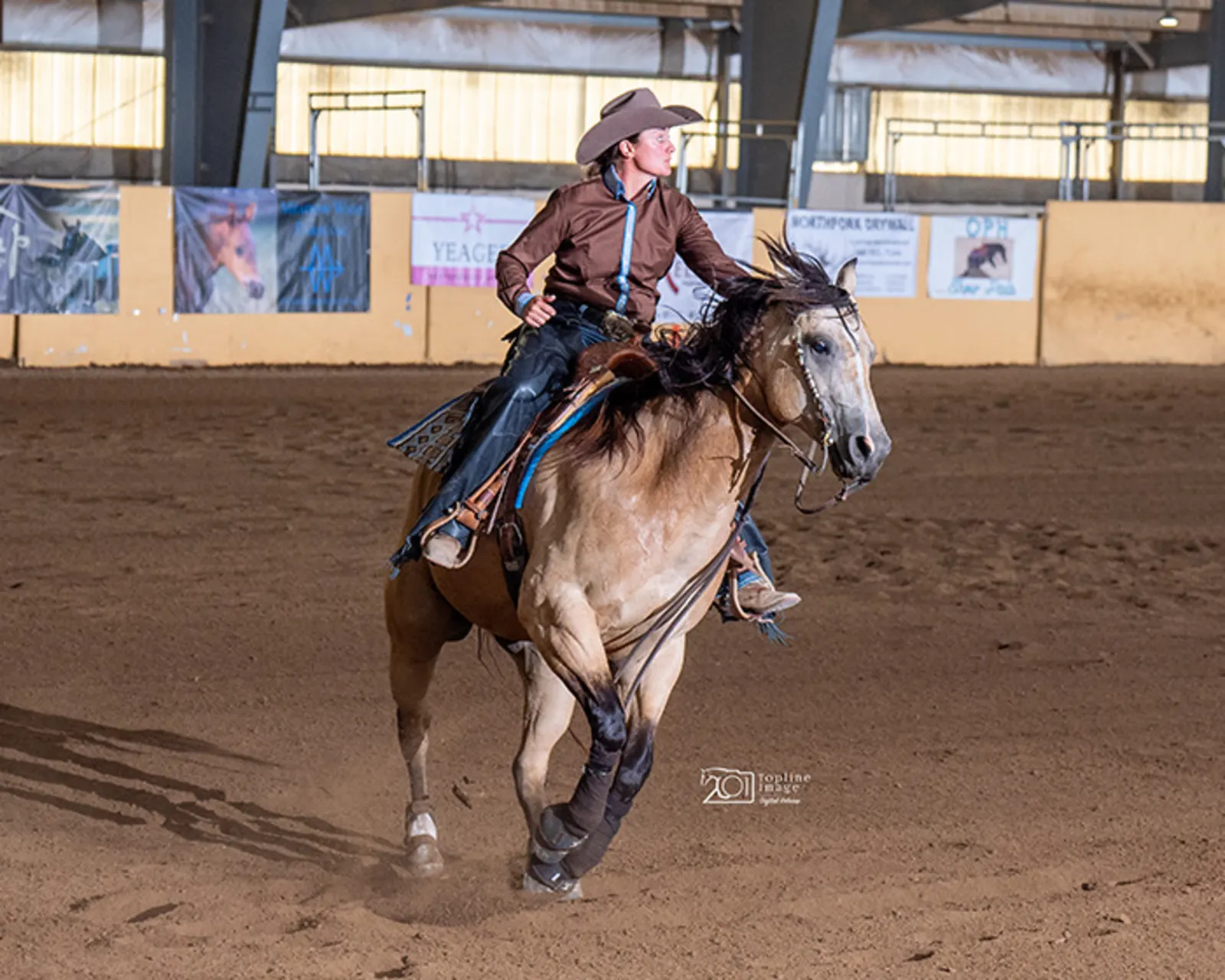 Kellie competing in reining